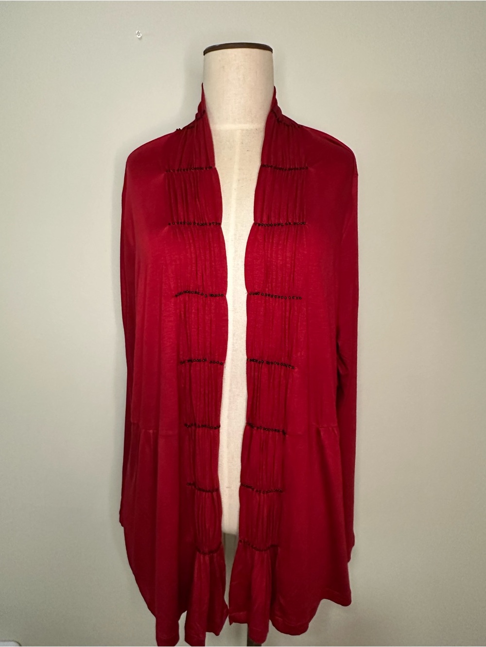 Lane Bryant 18/20W red cardigan with bead embellishment on sweater lapel.